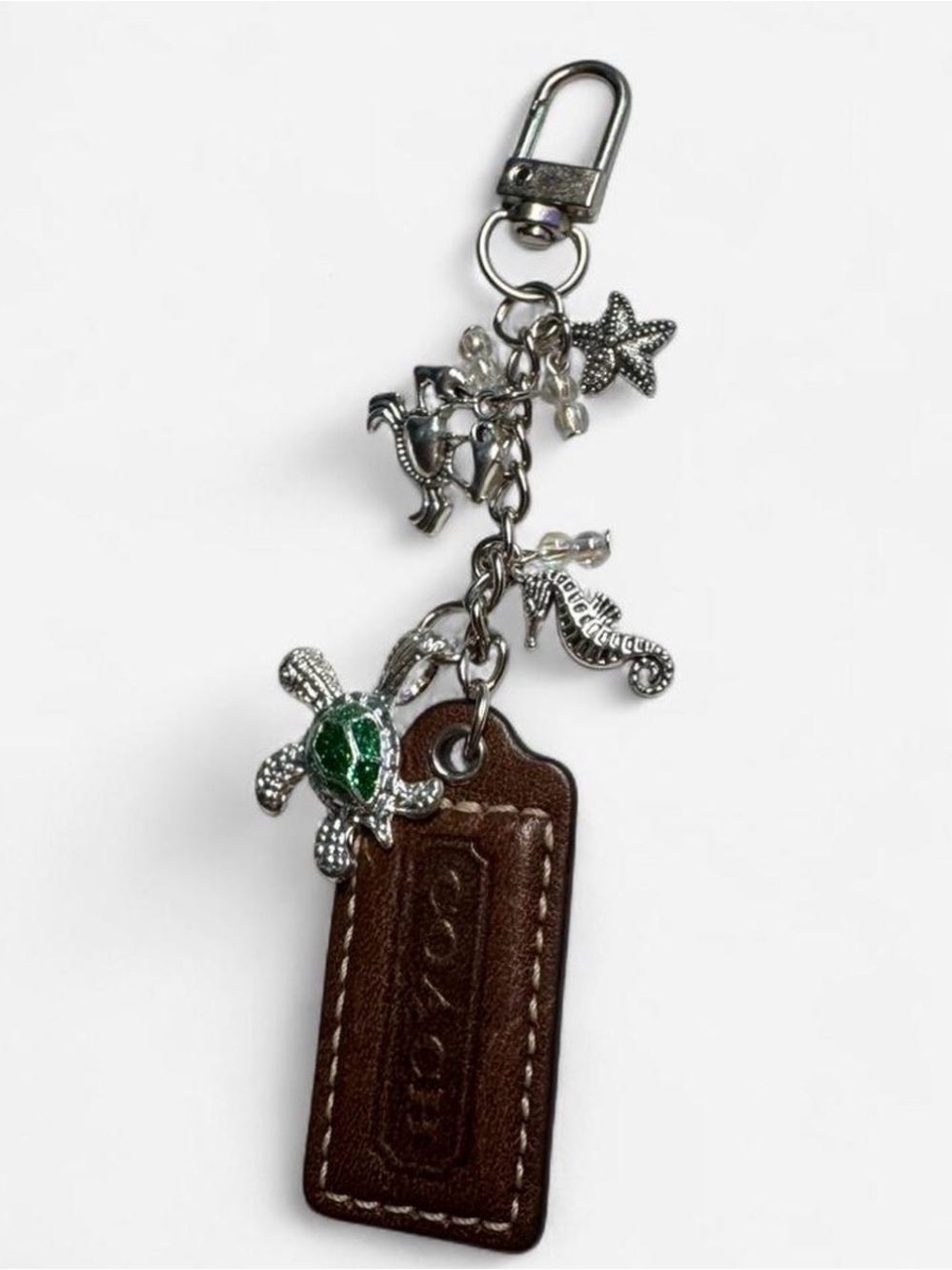 Coach Summertime Brown Leather Tag Keychain with Silver Sea Charms